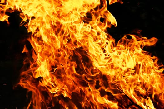 Beautiful yellow and orange hot fire on black background