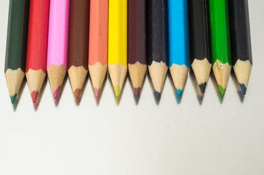 New Pencils Textured Set on a Colored Background
