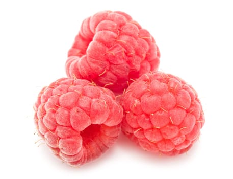 Ripe red raspberries isolated on white background
