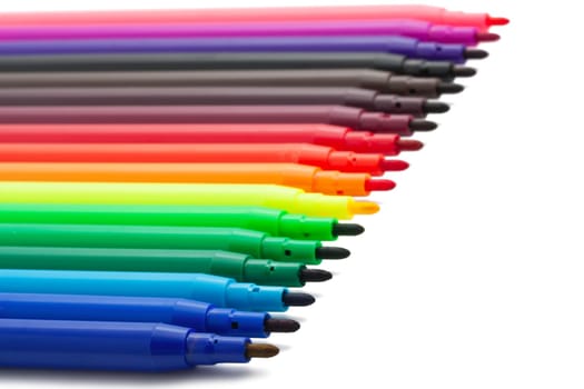Group of felt tip bright color markers on white background