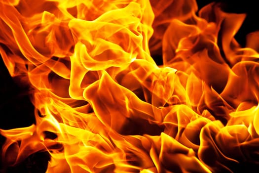 Beautiful yellow and orange hot fire on black background
