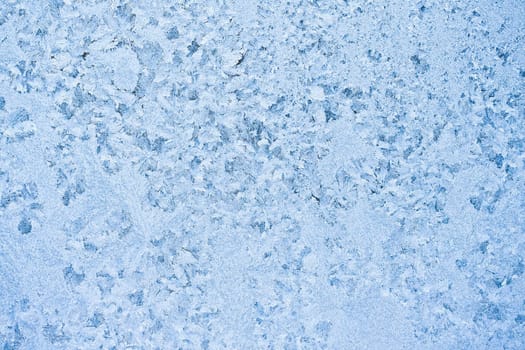 Beautiful pattern of frost on  winter window