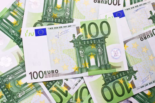 Many euro banknotes making european currency background