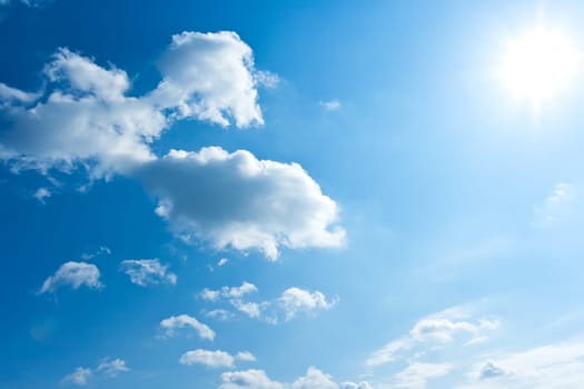 White clouds in blue summer sky background