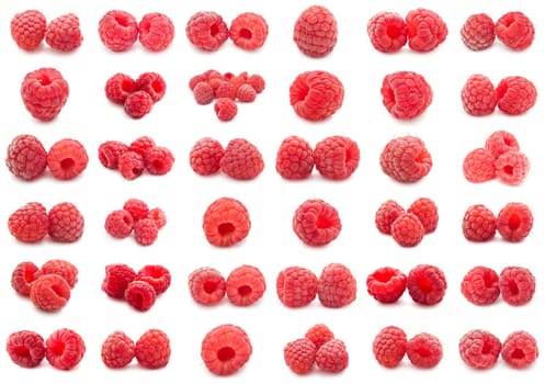 Collection of ripe red raspberries isolated on white background
