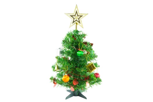 Christmas tree is ornamented with gold and silver gift box, heart red ribbon, orange and green Christmas ball, bell and gold star on white background.
