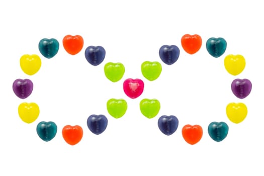 Heart shape confectionery is set in infinity style on white background
