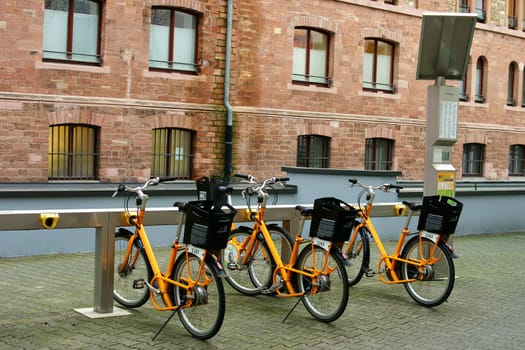 Mainz,Germany – January 21,2014: Bicycles stand one behind the other at a station of "MVGmeinRad"" of the Mainzer Verkehrsgesellschaft on January 21,2014 in Mainz."