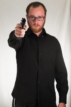 Black Dressed Young Man Holding a Pistol Gun