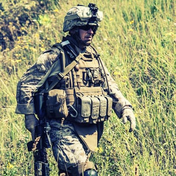 Close-up photo of US marine with his rifle