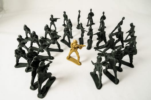 Plastic Lead Soldiers Representing War on a White Background