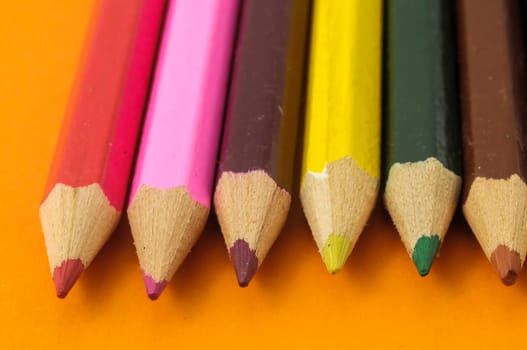 New Pencils Textured Set on a Colored Background