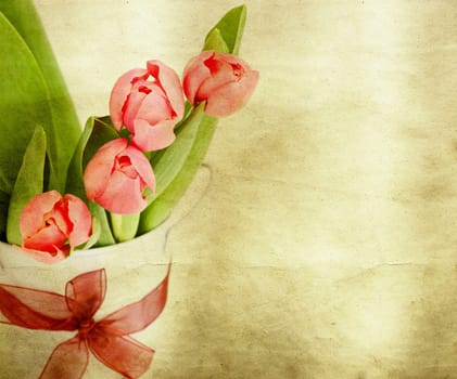 Beautiful pink tulips on vintage background
