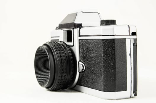 Classic 35mm Plastic Toy Photo Camera on a White Background
