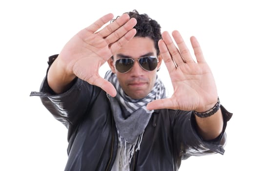 adult handsome man in a leather jacket with sunglasses zooming with his hands