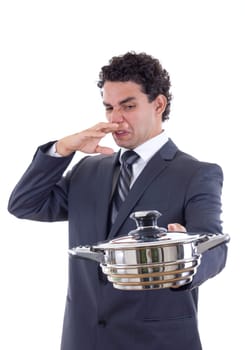 adult man in suit holding a pot for cooking that really stinks
