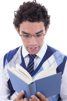 man with glasses and vest carefully reads the book