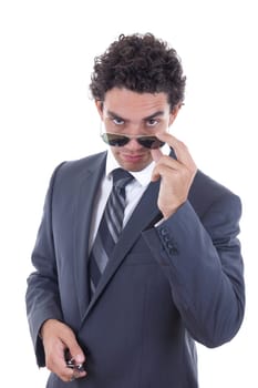 confident handsome businessman in suit with sunglasess