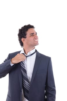 exhausted businessman in suit removing tie