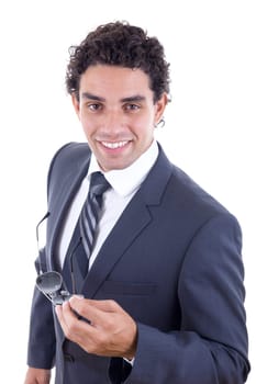 friendly businessman in suit holding sunglasess and smiling