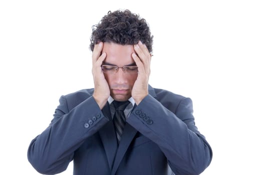 businessman with glasses holding his head in pain