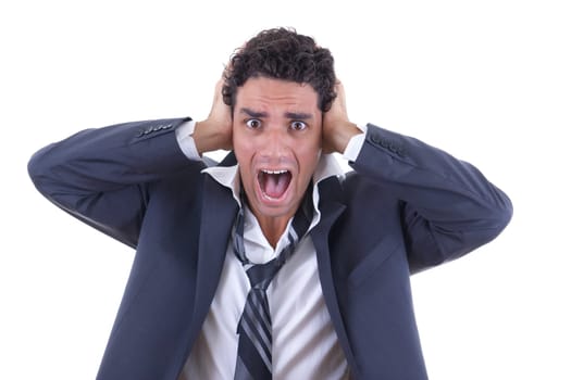 man in business suit holding his head and screaming