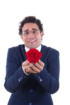 nerd in business suit with expression holding flower