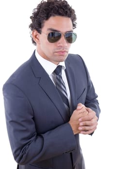 serious businessman in suit with sunglasess