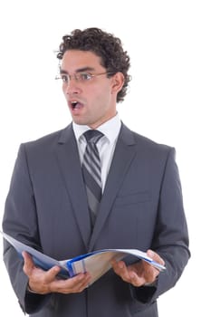 surprised young businessman holding an open notebook