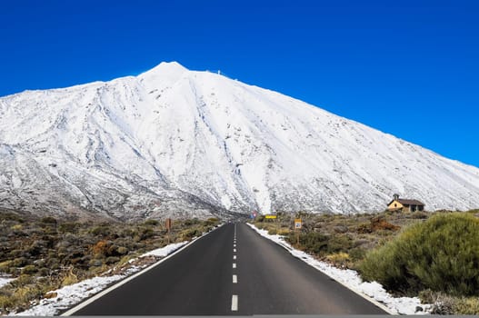 Snow Desert Lonely Road Landscape in Volcan Teide National Park, Tenerife, Canary Island, Spain