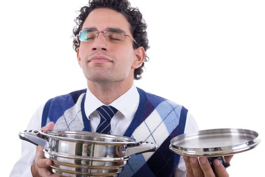 man with glasses smelling delicious lunch from pot
