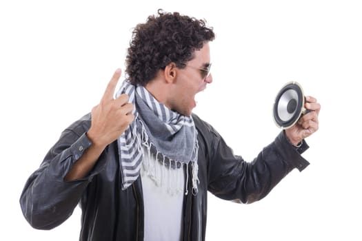 man in a leather jacket yelling to speaker