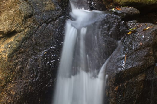 Nature waterfall in deep forest, in national park Thailand