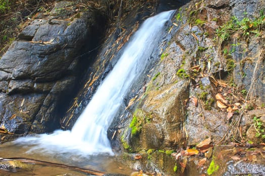Nature waterfall in deep forest, in national park Thailand