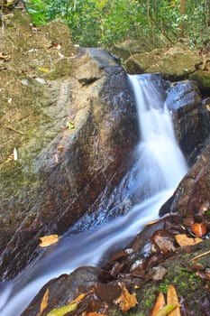 Nature waterfall in deep forest, in national park Thailand