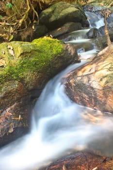 Nature waterfall in deep forest, in national park Thailand