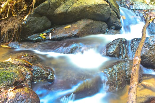 Nature waterfall in deep forest, in national park Thailand