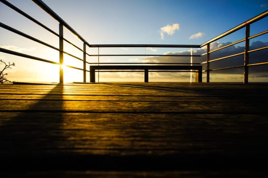 Sunrise on a Pier over Atlantic Ocean in Tenerife Canary Islands Spain