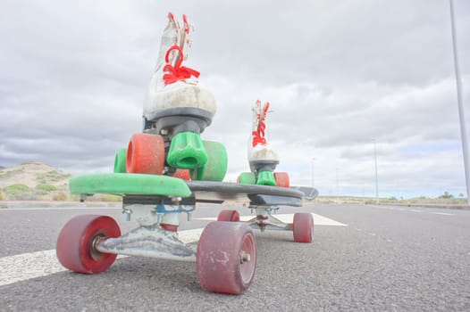 Hdr Picture of Old Vintage White Skate Boot on the Asphalt Sterret