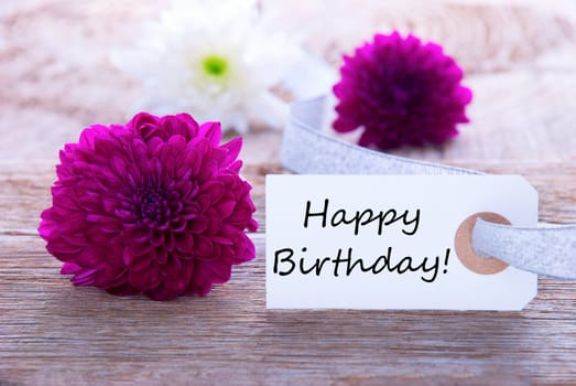 Label with Happy Birthday and Purple and White Flowers