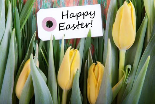 Happy Easter on a Label with Yellow Tulips