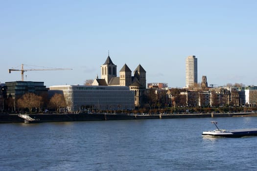 The skyline of Cologne with the Sankt Kunibert Church on the river Rhine.