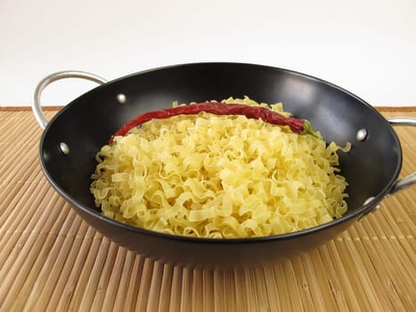 Woknudeln and chilli pepper