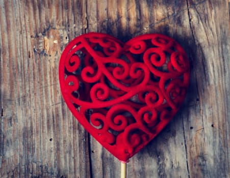 Valentine heart on rustic wooden background
