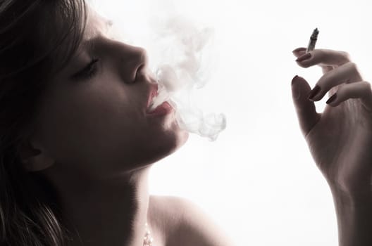 Portrait of young with cigarette