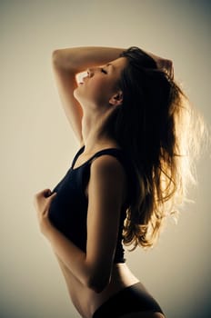 Beautiful seductive woman in black underwear