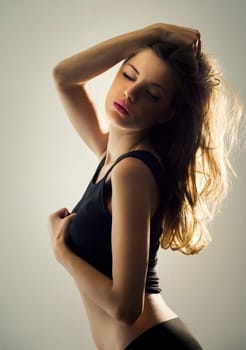 Beautiful seductive woman in black underwear