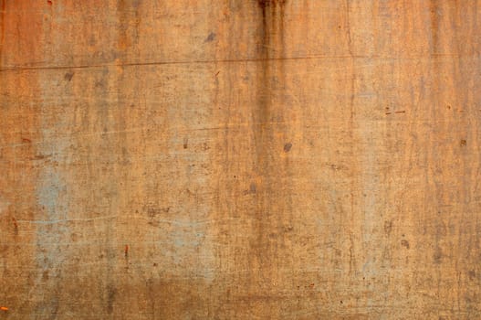 Old weathered painted metal surface as background