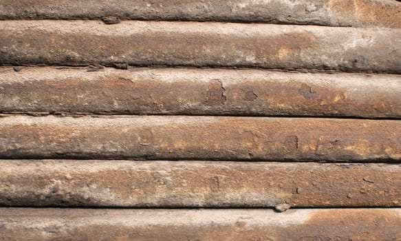 Old weathered grunge railway leaf springs closeup as background