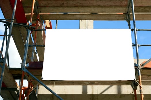 Renovation measure on house façade with construction sign and free text